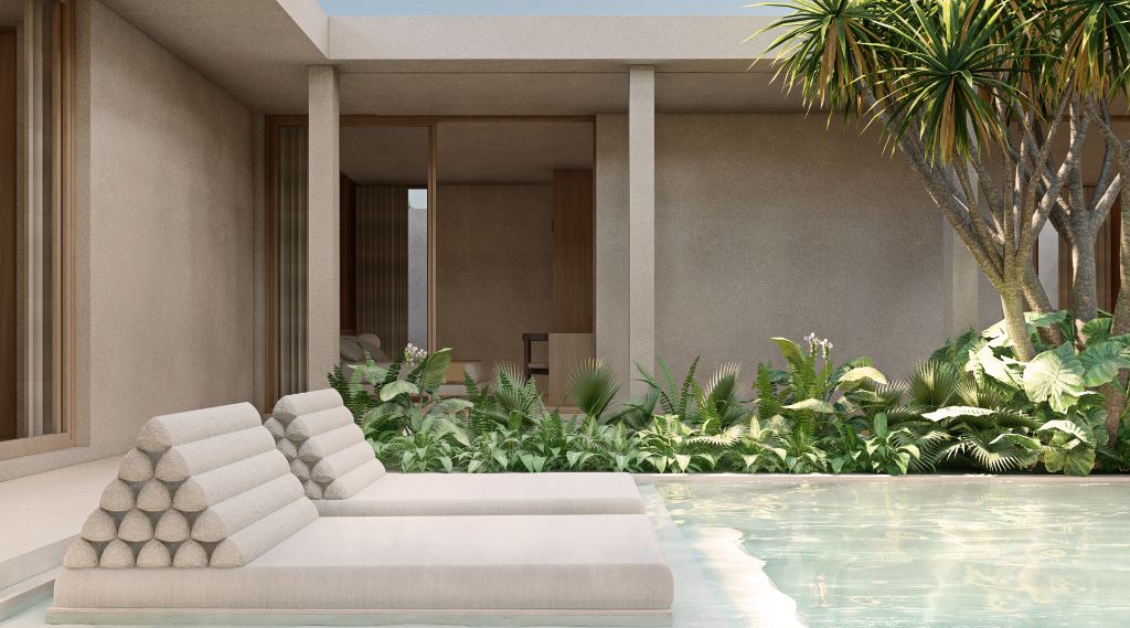 Pool lounge with daybeds and tropical garden