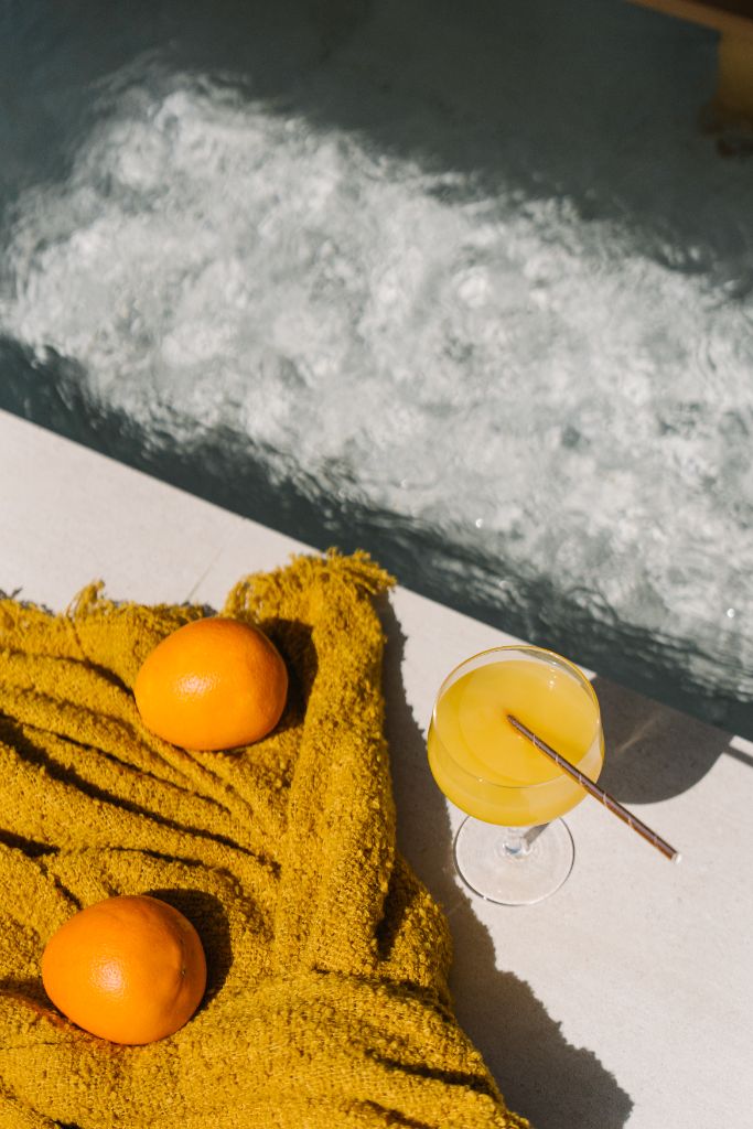 Sunroom poolside with citrus drink